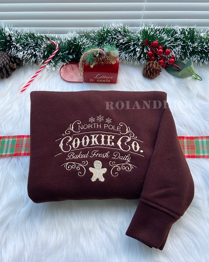 North Pole Cookie Co – Christmas Embroidered Sweatshirt North Pole Cookie Co – Christmas Embroidered Sweatshirt